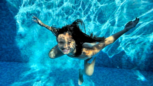 Girl in Clean Clear Pool